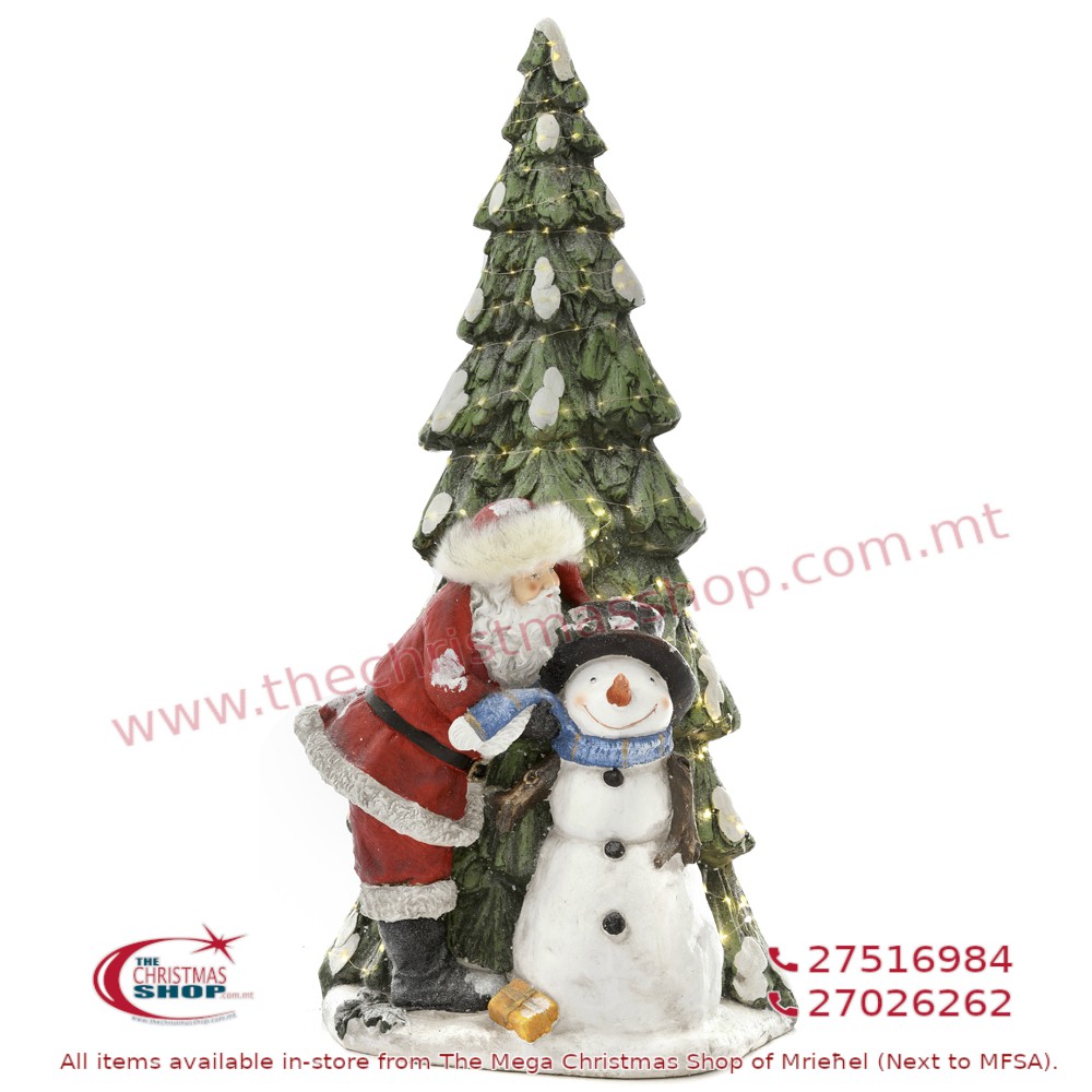 SANTA AND SNOWMAN UNDER CHRISTMAS TREE. IL684528